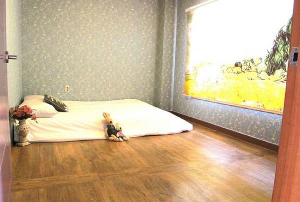Dg Beach Pension Jeju Zimmer foto